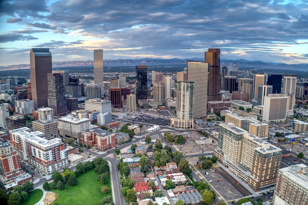 Denver Colorado skyline and mountains for a Realtor referral guide about clients moving to Nashville and Middle Tennessee