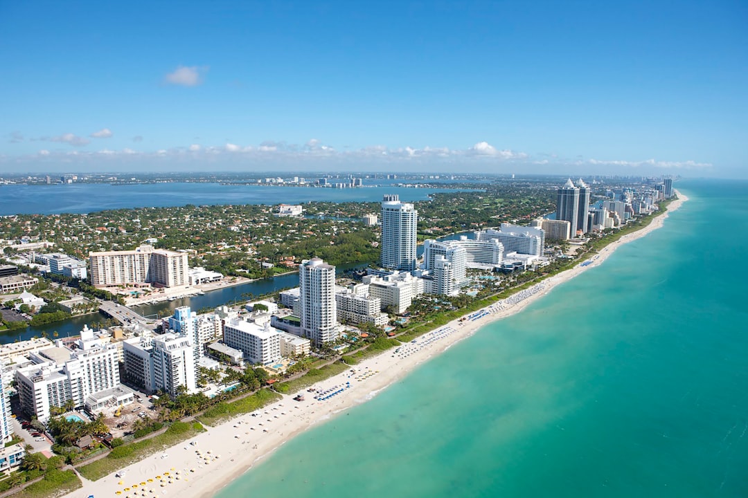 Aerial view of Miami Beach, ocean, and high-rise buildings