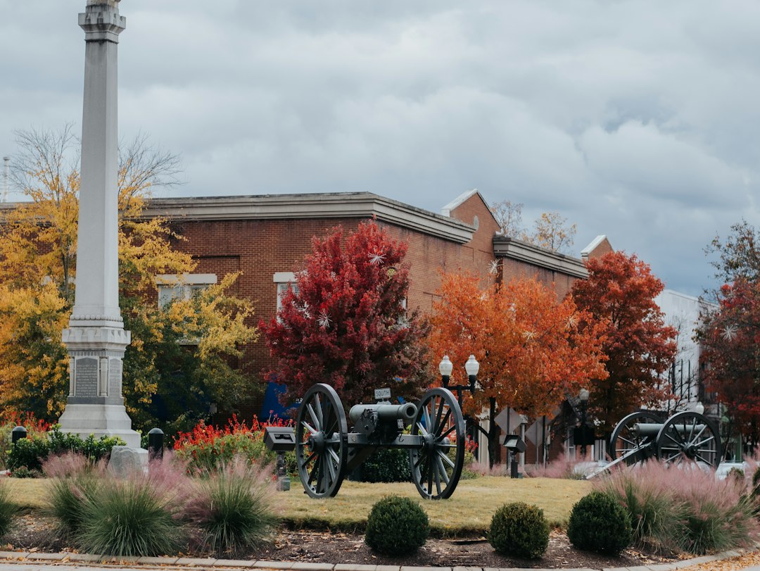 Historic square in Franklin, Tennessee, with fall trees and a monument