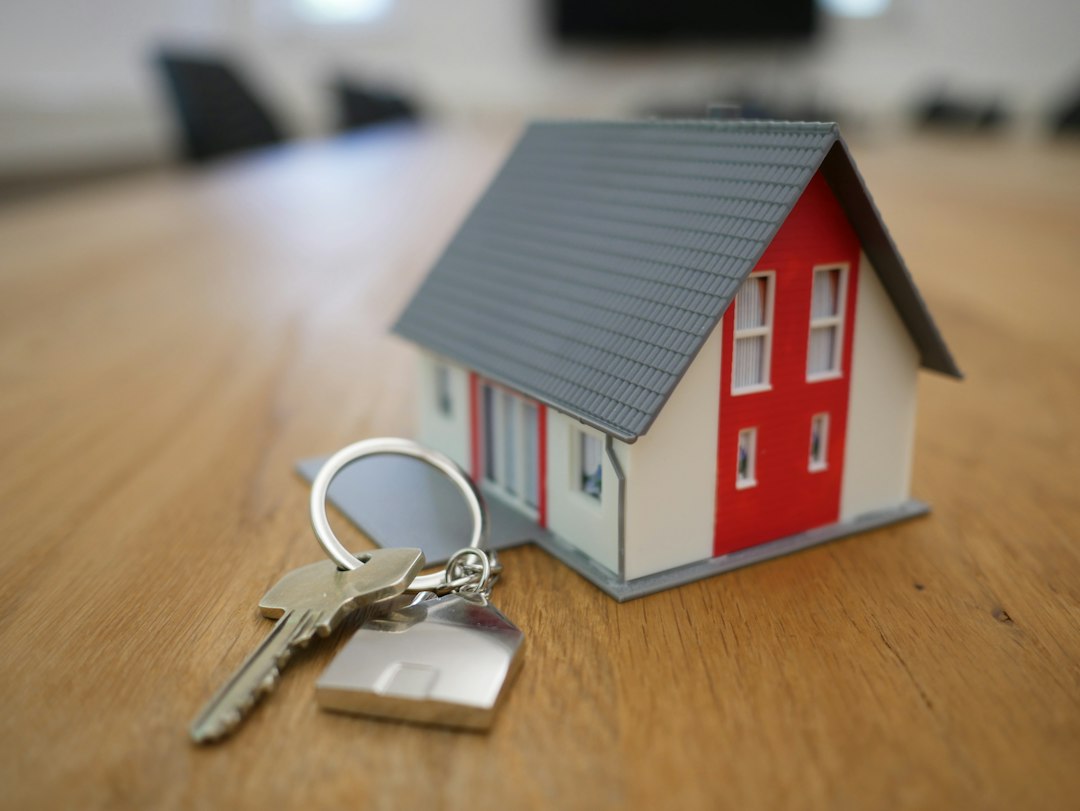 House model and keys on a table