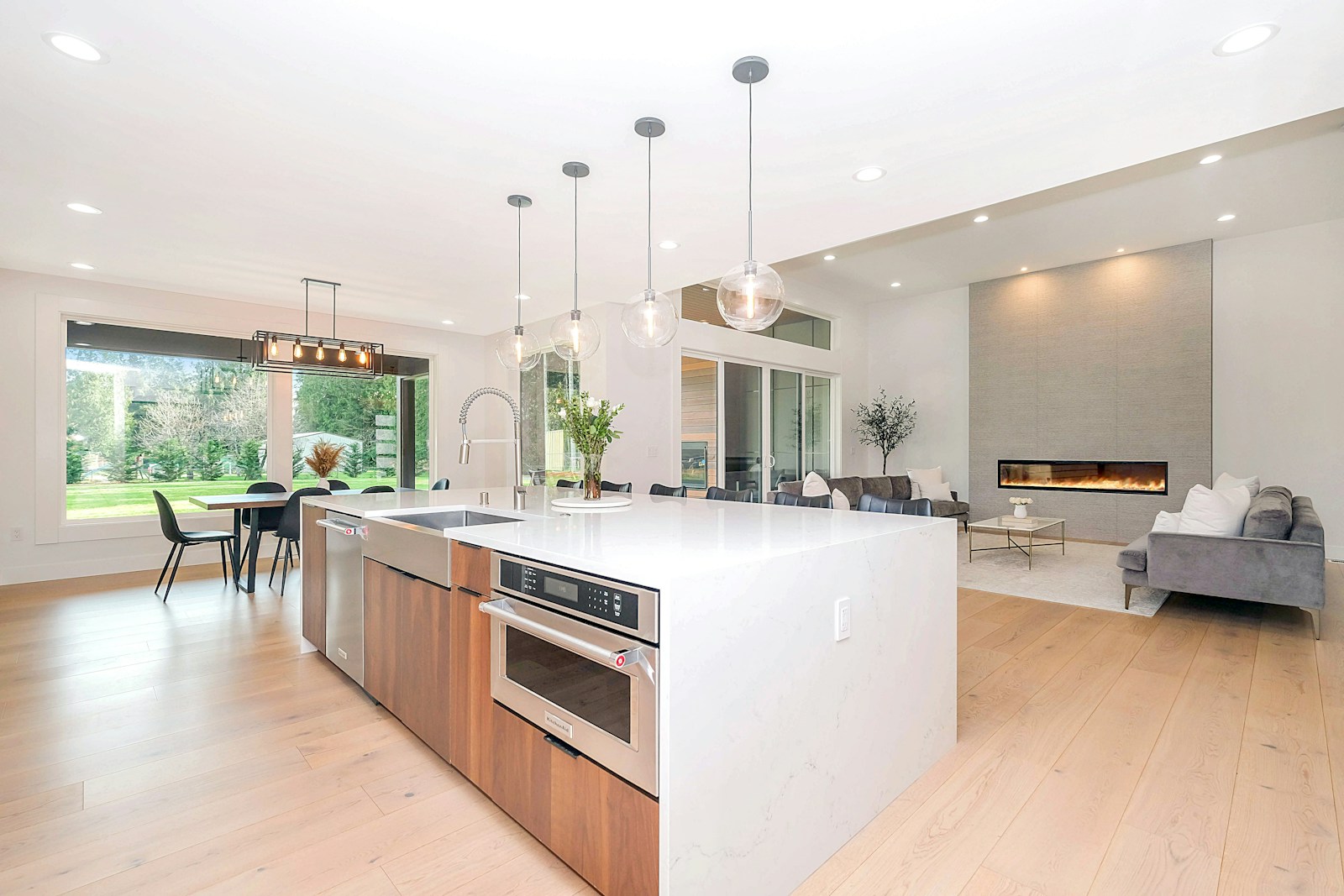 Kitchen with an island and light-colored cabinetry