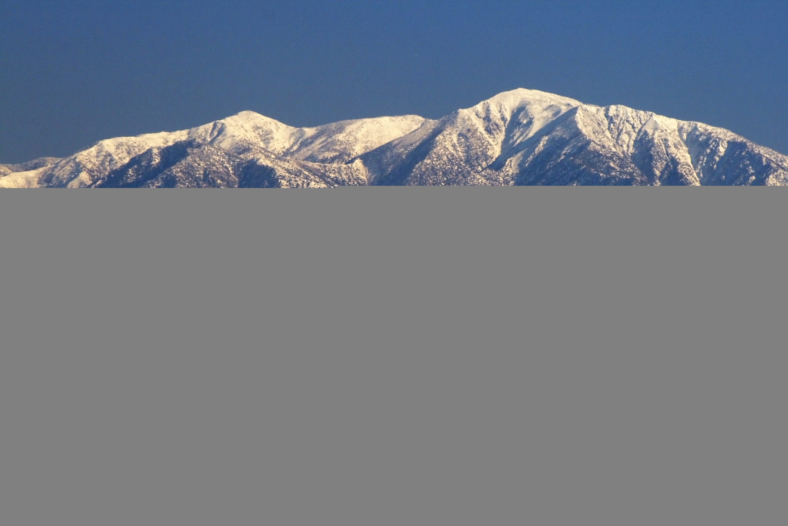 Los Angeles skyline with mountains