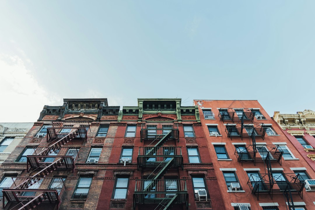 Brick apartment buildings with fire escapes